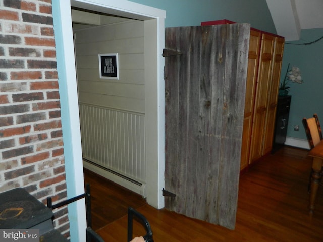 126 Ivy Ln, Lock Haven, PA 17745 - detailed view of a baseboard radiator and wood finished floors