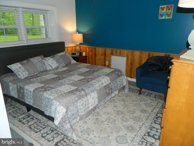 126 Ivy Ln, Lock Haven, PA 17745 - bedroom featuring wainscoting and wood walls