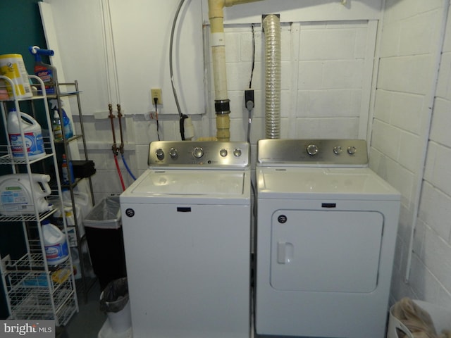 126 Ivy Ln, Lock Haven, PA 17745 - laundry area featuring washer and dryer and concrete block wall