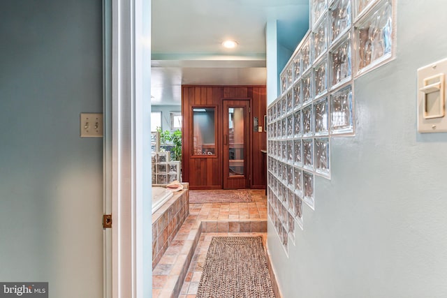 137 N 22nd St, Philadelphia, PA 19103 - hallway featuring stone tile flooring and recessed lighting