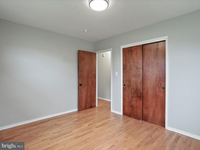 103 Plainfield Dr, Winchester, VA 22602 - unfurnished bedroom featuring a closet, light wood finished floors, and baseboards