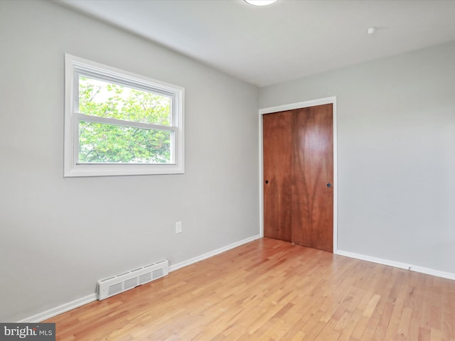 103 Plainfield Dr, Winchester, VA 22602 - unfurnished bedroom with light wood-style flooring, baseboards, and a closet