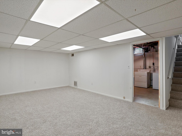 103 Plainfield Dr, Winchester, VA 22602 - finished below grade area with washer and dryer, stairway, carpet, a drop ceiling, and baseboards