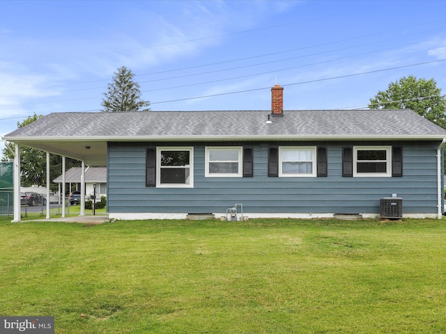 103 Plainfield Dr, Winchester, VA 22602 - rear view of property with cooling unit, a lawn, a chimney, and roof with shingles