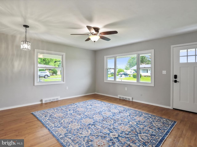 103 Plainfield Dr, Winchester, VA 22602 - foyer with a ceiling fan, baseboards, wood finished floors, and a chandelier