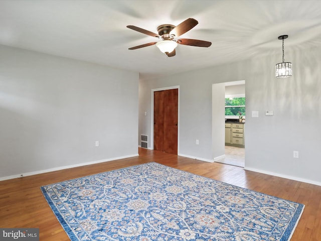 103 Plainfield Dr, Winchester, VA 22602 - empty room with a ceiling fan, wood finished floors, and baseboards