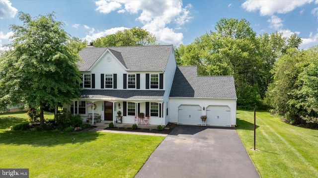5251 Downs Run, Pipersville, PA 18947 - colonial inspired home featuring covered porch, an attached garage, asphalt driveway, a front lawn, and roof with shingles