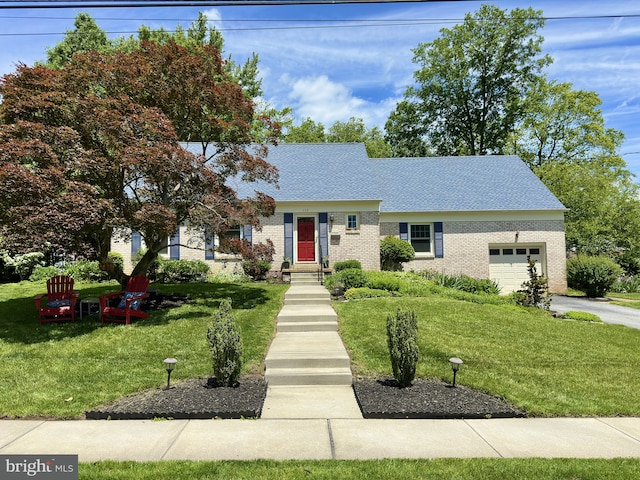 113 Sypherd Dr, Newark, DE 19711 - view of front facade featuring an attached garage, a front yard, and brick siding