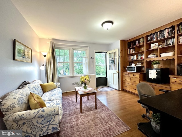 113 Sypherd Dr, Newark, DE 19711 - living area with wood finished floors and a desk