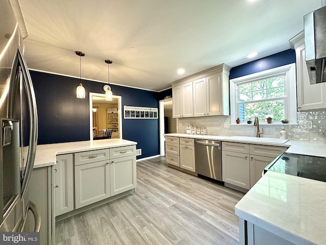 113 Sypherd Dr, Newark, DE 19711 - kitchen with stainless steel appliances, pendant lighting, backsplash, light wood-style floors, and recessed lighting