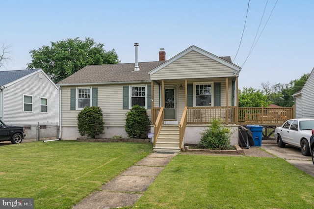 224 W Underwood Ave, West Deptford, NJ 08096 - bungalow-style home with a porch, a chimney, and roof with shingles