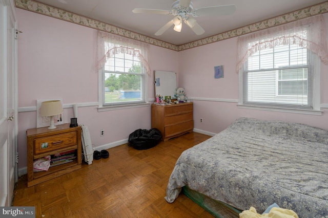 224 W Underwood Ave, West Deptford, NJ 08096 - bedroom featuring multiple windows, baseboards, and ceiling fan