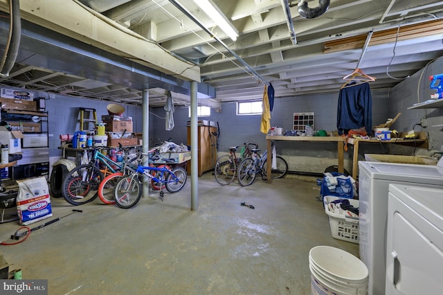 224 W Underwood Ave, West Deptford, NJ 08096 - below grade area featuring washing machine and dryer and concrete block wall