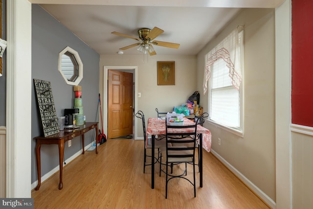 224 W Underwood Ave, West Deptford, NJ 08096 - dining area with light wood-style flooring, a ceiling fan, and baseboards