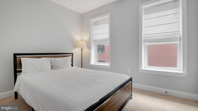 1323 Clifton St NW Unit 34, Washington, DC 20009 - bedroom featuring carpet and multiple windows