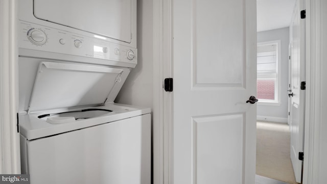 1323 Clifton St NW Unit 34, Washington, DC 20009 - laundry room with stacked washer / dryer