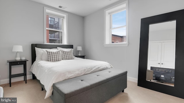 1323 Clifton St NW Unit 34, Washington, DC 20009 - bedroom with light carpet