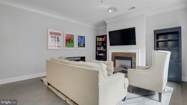 1323 Clifton St NW Unit 34, Washington, DC 20009 - living area with crown molding, a fireplace, and wood finished floors