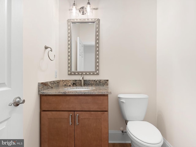 105 Sutton Way, Newark, DE 19711 - bathroom with vanity, toilet, and baseboards