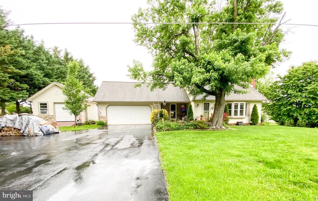 50 Valleyview Dr, Littlestown, PA 17340 - view of front of property featuring asphalt driveway, an attached garage, and a front lawn
