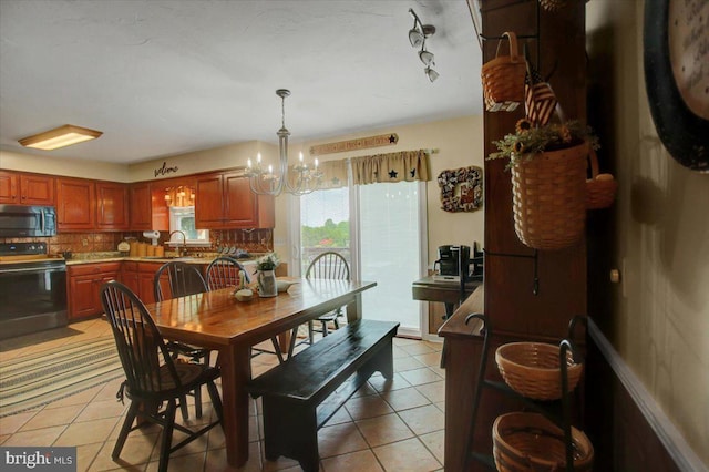 50 Valleyview Dr, Littlestown, PA 17340 - dining room featuring light tile patterned floors and a chandelier