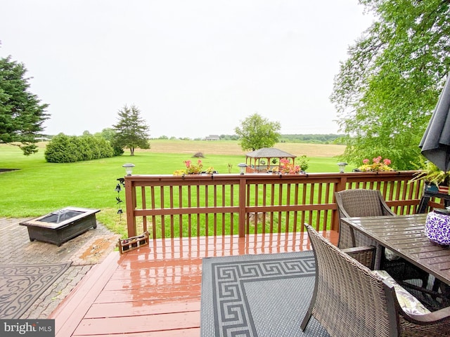 50 Valleyview Dr, Littlestown, PA 17340 - wooden terrace with outdoor dining area, a yard, and a fire pit