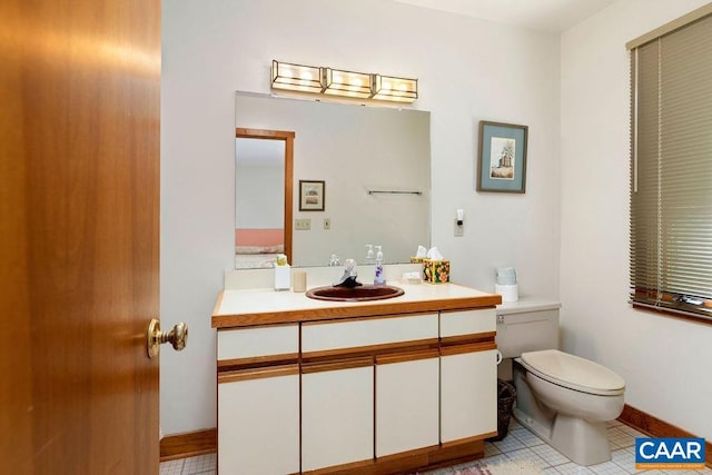 98 Pedlars Pt, Roseland, VA 22967 - half bath featuring toilet, vanity, tile patterned floors, and baseboards