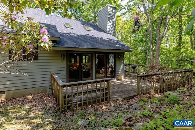 98 Pedlars Pt, Roseland, VA 22967 - rear view of house featuring roof with shingles, a chimney, and a wooden deck