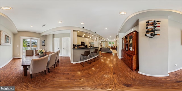 422 Hamilton St NW, Washington, DC 20011 - dining area with baseboards, wood finished floors, and recessed lighting