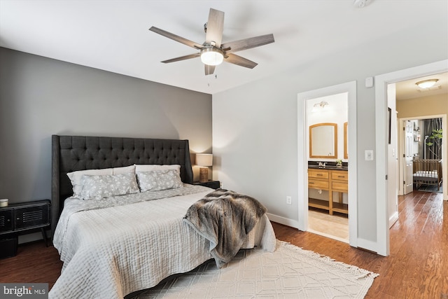 422 Hamilton St NW, Washington, DC 20011 - bedroom with wood finished floors, baseboards, a ceiling fan, and ensuite bath