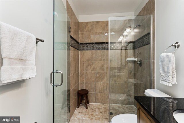 422 Hamilton St NW, Washington, DC 20011 - bathroom featuring vanity, a shower stall, and toilet