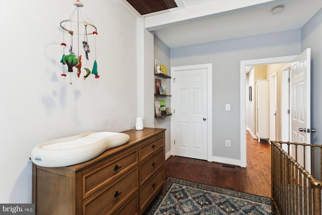 422 Hamilton St NW, Washington, DC 20011 - bedroom featuring dark wood finished floors and baseboards