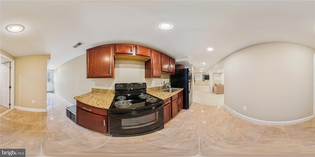 422 Hamilton St NW, Washington, DC 20011 - kitchen featuring black appliances, light stone countertops, recessed lighting, a sink, and baseboards