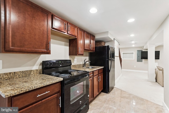 422 Hamilton St NW, Washington, DC 20011 - kitchen featuring black appliances, a sink, light stone countertops, recessed lighting, and baseboards
