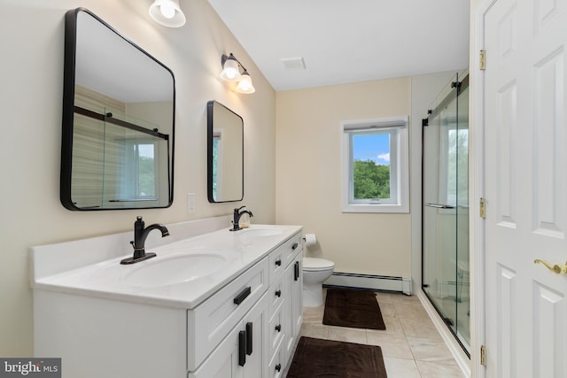 173 Old Beekman Rd, Monmouth Junction, NJ 08852 - full bathroom featuring a baseboard heating unit, double vanity, a shower stall, toilet, and tile patterned floors