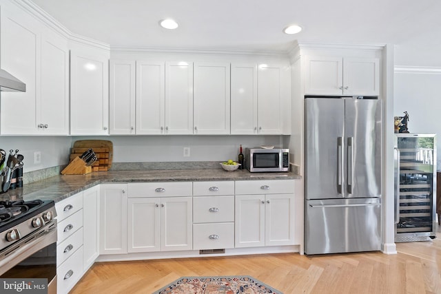 128 N Jay St, Middleburg, VA 20117 - kitchen featuring appliances with stainless steel finishes, wine cooler, white cabinetry, stone countertops, and recessed lighting