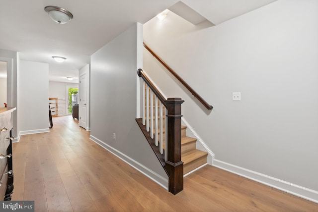 128 N Jay St, Middleburg, VA 20117 - stairs with wood-type flooring and baseboards