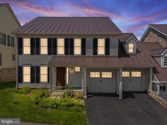 128 N Jay St, Middleburg, VA 20117 - view of front of property with a standing seam roof, metal roof, asphalt driveway, and a garage
