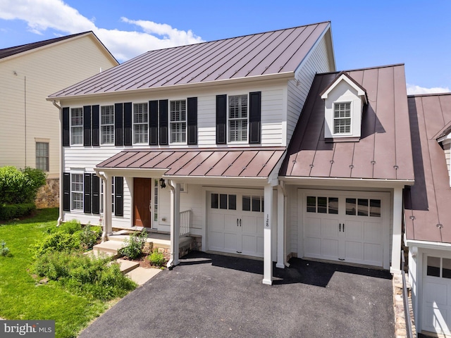 128 N Jay St, Middleburg, VA 20117 - view of front of house featuring a standing seam roof, metal roof, and driveway
