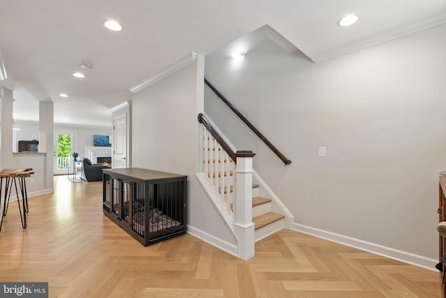 128 N Jay St, Middleburg, VA 20117 - staircase featuring baseboards, recessed lighting, ornamental molding, and a lit fireplace