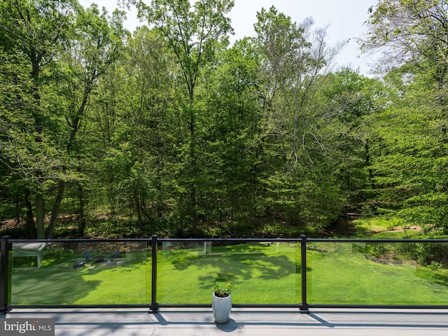 2762 Horseshoe Trl, Chester Springs, PA 19425 - wooden terrace with a yard and a wooded view