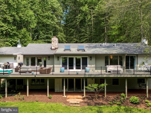 2762 Horseshoe Trl, Chester Springs, PA 19425 - back of house featuring a deck and a chimney