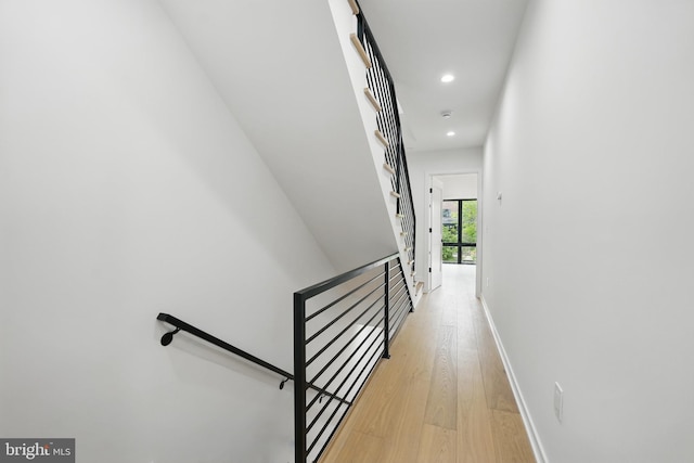 3802 T St NW, Washington, DC 20007 - hall with an upstairs landing, light wood-type flooring, recessed lighting, and baseboards