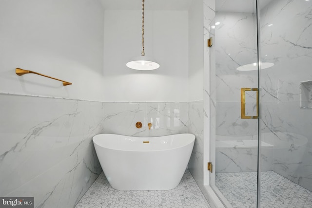 3802 T St NW, Washington, DC 20007 - full bath featuring a freestanding bath, a wainscoted wall, a marble finish shower, and tile walls