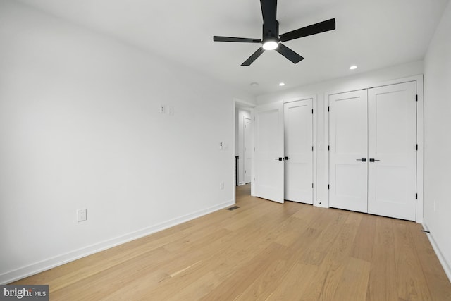 3802 T St NW, Washington, DC 20007 - unfurnished bedroom featuring two closets, recessed lighting, light wood-style floors, baseboards, and ceiling fan
