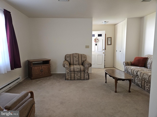 26 Kingston Way, Southampton, NJ 08088 - carpeted living room featuring a baseboard heating unit