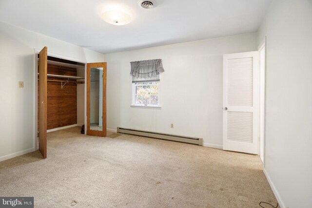 52 Golden Maple Ln, Maurertown, VA 22644 - unfurnished bedroom with baseboard heating, carpet floors, a closet, and baseboards