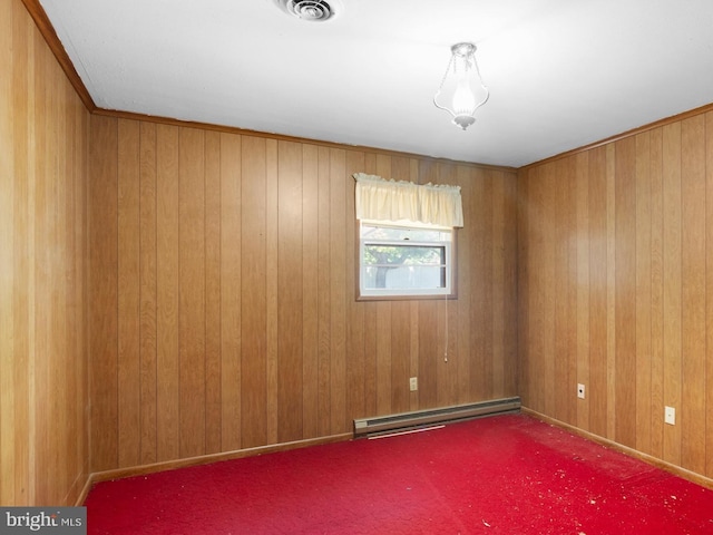 52 Golden Maple Ln, Maurertown, VA 22644 - spare room with baseboard heating, carpet, and wooden walls