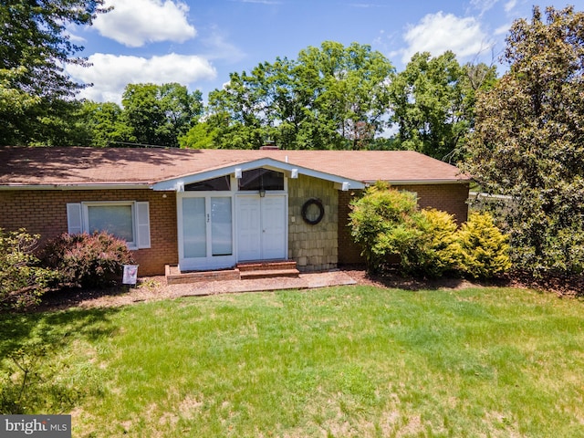 52 Golden Maple Ln, Maurertown, VA 22644 - view of front of home with a front yard, brick siding, entry steps, and roof with shingles