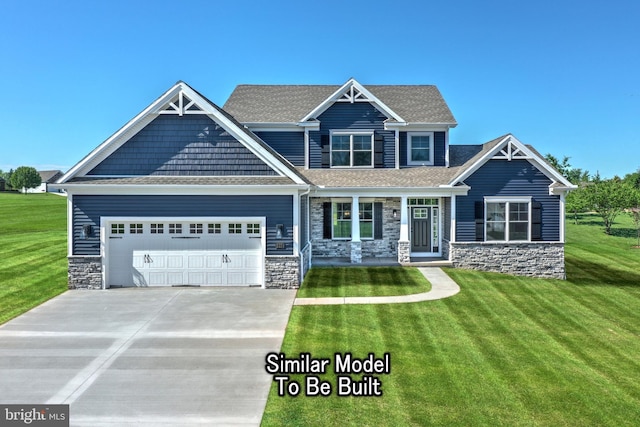 3227 Oxford Rd, New Oxford, PA 17350 - craftsman house featuring an attached garage, a front yard, concrete driveway, and stone siding